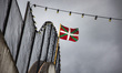 A Basque flag flyes on a grey sky in Sare, in the Basque area of the region Nouvelle-Aquit...