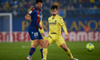 Gonzalo Melero (L) of Levante UD competes for the ball with Manu Trigueros of Villarreal C...