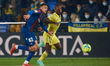 Pervis Josue Estupinan (R) of Villarreal CF competes for the ball with Marc Pubill of Leva...