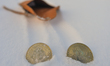 Illustrative image of two commemorative bitcoins seen in the snow. On Thursday, January 6...