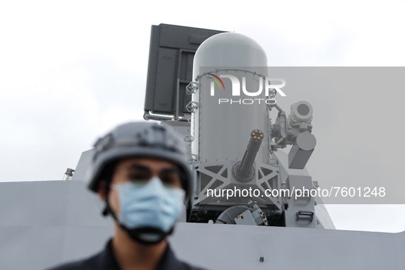A navy soldier is seen standing guard under a machine gun on a Taiwanese military corvette during a Navy Drill for Preparedness Enhancement...
