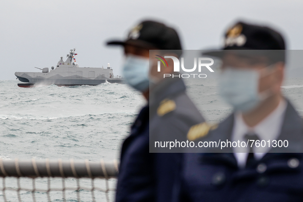 A Taiwanese military corvette sails as navy officers stand guard on a vessel, during a Navy Drill for Preparedness Enhancement ahead of the...