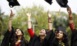 Cheerful graduats at the 48th convocation of Dhaka University (DU) in front of ''Raju vash...
