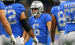 Detroit Lions kicker Riley Patterson (6) is congratulated by teammates after making the ex...