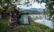 Villagers participate in a community fishing event on the occasion of Bhogali Bihu Festiva...