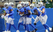 Detroit Lions defensive back C.J. Moore (38) is congratulated by teammates after making a...