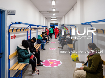 Teens in the waiting room after having the vaccine during the night dedicated to 12-19 year olds at the Cozzoli vaccination hub in Molfetta...