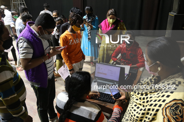 People register themselves to get inoculated against coronavirus inside a Vaccine Center  in Kolkata , India on January 19, 2022. 