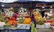 A fruit seller is selling his fruit in Dhaka, Bangladesh on August 23, 2021. 