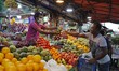 A fruit seller is selling his fruit in Dhaka, Bangladesh on August 23, 2021. 