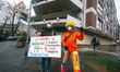 counter anti vaxxers are seen holding sign " solidate to vaccination "  confronting with a...