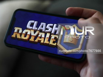 Clash Royale logo displayed on a phone screen is seen in this illustration photo taken in Krakow, Poland on January 23, 2022. (