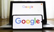 Google logo is displayed on a mobile phone screen and laptop screen for illustration photo...