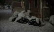 Motorbikes covered with snow at Pagrati neighborhood in central Athens, in Athens, Greece,...
