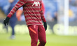 Liverpool's Kostas Tsimikas during the pre-match warm-up   during Premier League between C...