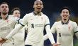 LONDON, United Kingdom, JANUARY 23: Liverpool's Fabinho celebrates with Liverpool's Jordan...