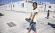 A little girl carries her food in the camp. Inside the new Refugee camp in Samos island th...