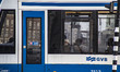 People are spotted in the tramway wearing facemask.Tram in Amsterdam is part of the public...