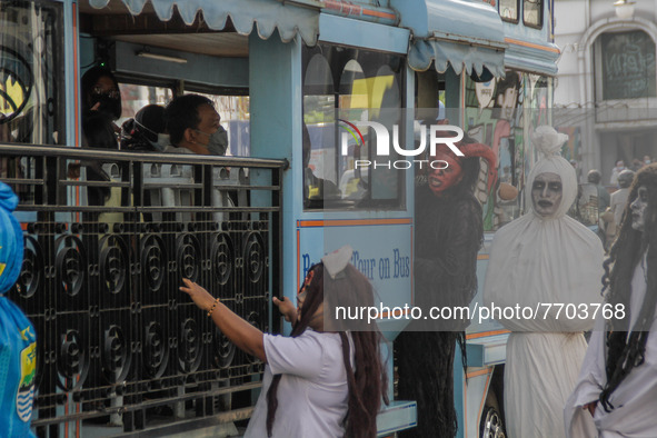 Cosplayer dressed as ghost is seen near Gedung Merdeka Tourism Area on January 29, 2022 in Bandung, Indonesia. Based on data from the Global...