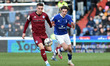 Oldham Athletic's Samuel Hart tussles with George Broadbent of Rochdale Association Footba...