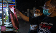 People buy milkfish in Rawa Belong, Jakarta on 30 January 2022. Nearing the Chinese New Ye...