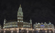 Panoramic night view with the illuminated historic picturesque buildings of Grand Place sq...
