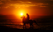 A Palestinian man rides his horse in front of Gaza beach during sunset, on February 01, 20...