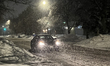 Car driving as snow covered the city of  Toronto, Ontario, Canada, on February 02, 2022. T...