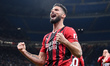 Olivier Giroud of AC Milan celebrates after scoring second goal during the Italian Cup mat...