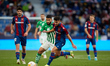 Rober Pier (R) of Levante UD competes for the ball with Nabil Fekir of Real Betis during t...