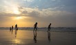 Palestinian children play on a beach At sunset in Gaza City, on September 15, 2015. 