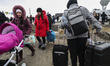 Refugges fleeing from Ukraine are seen after crossing Ukrainian-Polish border due to Russi...