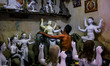 Sept 15, 2015 - Dhaka, Bangladesh - A Hindu man coloring statues in his shop.  