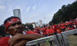 A demonstrator take part a pro-government demonstration in Kuala Lumpur on September 16, 2...