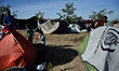 Migrants trying to reach the borders of european union are waiting in a improvise camp nea...