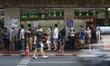 Customers queue outside a gold shop in Chinatown, Bangkok, Thailand, 10 March 2022. People...