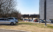 Police monitor an exit on I-395 in Washington, D.C. on March 15, 2022 as a convoy of truck...