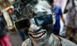 People from the Hindu community celebrate the Dol Purnima festival as they play with color...