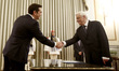 Greece's leftwing Syriza leader and newly elected Greek Prime Minister Alexis Tsipras (L)...