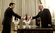 Greece's leftwing Syriza leader and newly elected Greek Prime Minister Alexis Tsipras (L)...