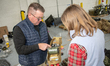Volunteers with the Ukrainian-American Crisis Response Committee pack field medic bags on...