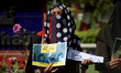 A Muslim student holds a placard during a protest by Campus Front of India (CFI) against t...