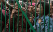 Thousands Indonesian Muslims queue to get a share of the sacrificial meat during celebrati...