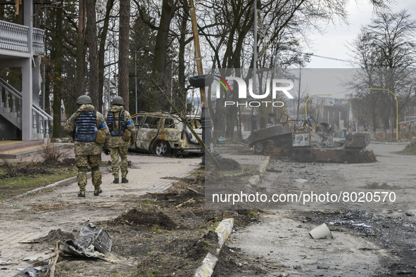 Street with destroyed Russian military machinery in the recaptured by the Ukrainian army Bucha city near Kyiv, Ukraine, 04 April 2022. 