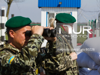 Ukrainian border guards patrol at the fighting position on Border Crossing Point on the Ukrainian-Moldovan border (