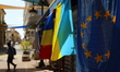 The flag of the European Union and the National flag of Ukraine are sold on a shopping str...