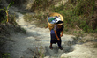 Women and girl are going to collect water from long distance. During hot summer season Ind...