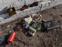 BUCHA, UKRAINE - APRIL 7, 2022 - The belongings left by a Russian occupier lie on the ground as seen after the liberation of the city from R...