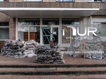 BUCHA, UKRAINE - APRIL 7, 2022 - Sandbags are piled at the entrance to a building as seen after the liberation of the city from Russian inva...