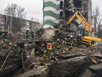 Ukrainian Rescuers worked to clear the rubble after the collapse of buildings destroyed by russian army in Borodyanka city near Kyiv, Ukrain...